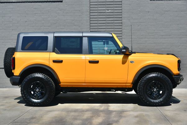 2022 Ford Bronco Wildtrak V6 4-Door, Cyber Orange Metallic, previously sold by Sandbox Motors