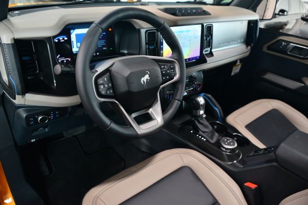 2022 Ford Bronco Wildtrak V6 4-Door, Cyber Orange Metallic, previously sold by Sandbox Motors