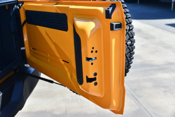 2022 Ford Bronco Wildtrak V6 4-Door, Cyber Orange Metallic, previously sold by Sandbox Motors