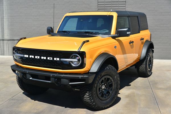 2022 Ford Bronco Wildtrak V6 4-Door, Cyber Orange Metallic, previously sold by Sandbox Motors