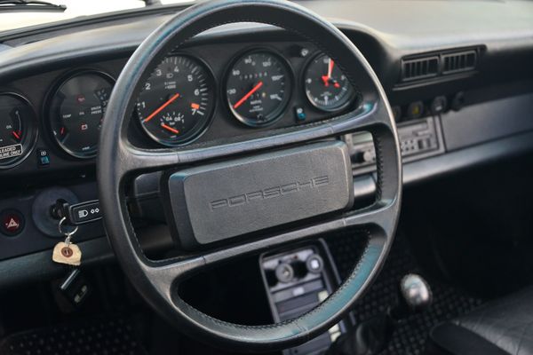 1985 Porsche 930 for sale and sold by Sandbox Motors. A stunning black Turbo Coupe.