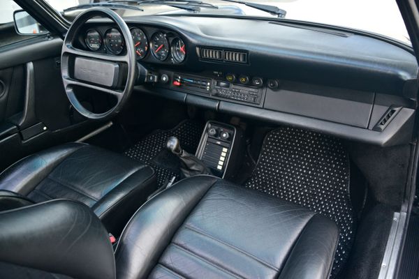 1985 Porsche 930 for sale and sold by Sandbox Motors. A stunning black Turbo Coupe.