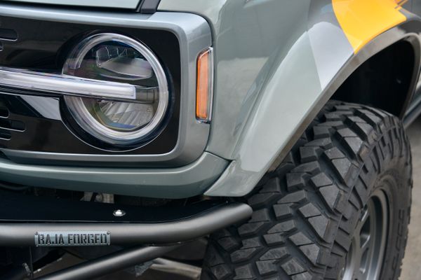 2022 Ford Bronco Wildtrak V6 4-Door, gray with orange accents, previously sold by Sandbox Motors