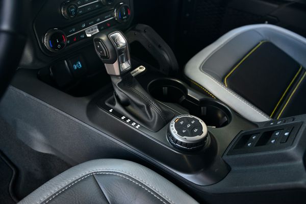 2022 Ford Bronco Wildtrak V6 4-Door, gray with orange accents, previously sold by Sandbox Motors