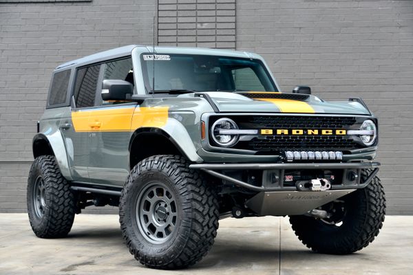 2022 Ford Bronco Wildtrak V6 4-Door, gray with orange accents, previously sold by Sandbox Motors