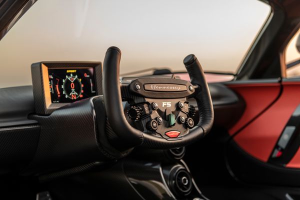 stunning red 2023 Hennessey Venom F5 for sale and sold by Sandbox Motors