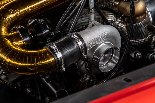 stunning red 2023 Hennessey Venom F5 for sale and sold by Sandbox Motors