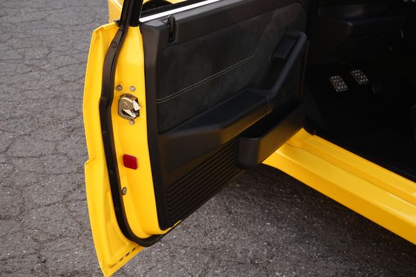 Yellow 1994 Lancia Delta Integrale Evo 2 previously sold by Sandbox Motors