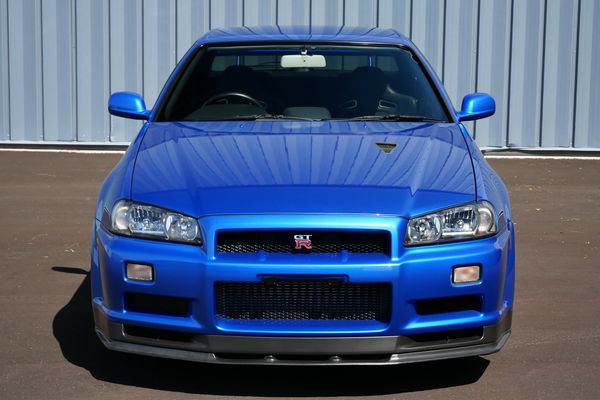 blue 2001 Nissan Skyline GT-R R34 V-spec 2 for sale by Sandbox Motors