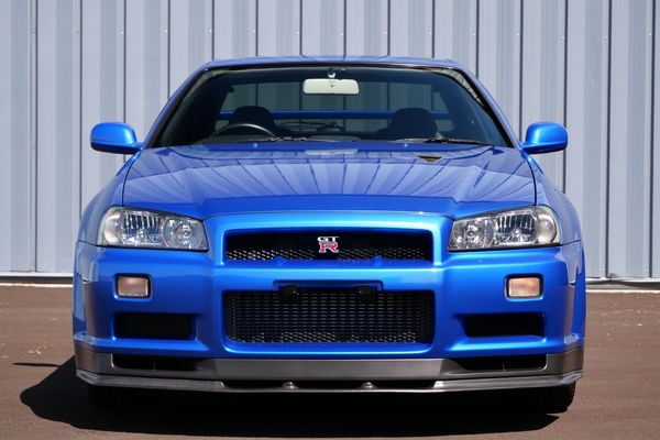 blue 2001 Nissan Skyline GT-R R34 V-spec 2 for sale by Sandbox Motors