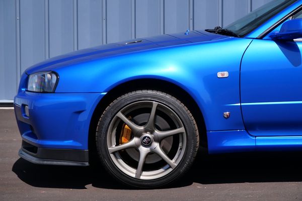 blue 2001 Nissan Skyline GT-R R34 V-spec 2 for sale by Sandbox Motors