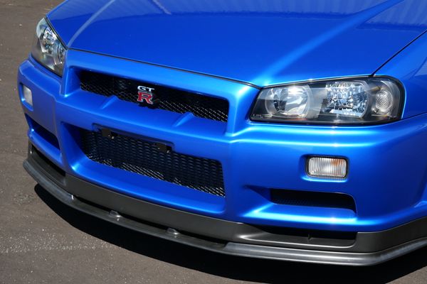 blue 2001 Nissan Skyline GT-R R34 V-spec 2 for sale by Sandbox Motors