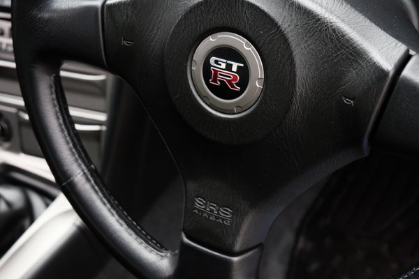 blue 2001 Nissan Skyline GT-R R34 V-spec 2 for sale by Sandbox Motors