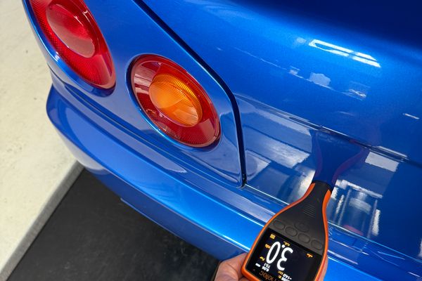 blue 2001 Nissan Skyline GT-R R34 V-spec 2 for sale by Sandbox Motors