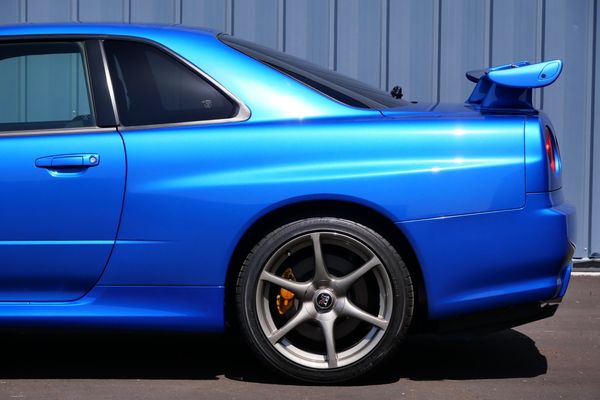 blue 2001 Nissan Skyline GT-R R34 V-spec 2 for sale by Sandbox Motors