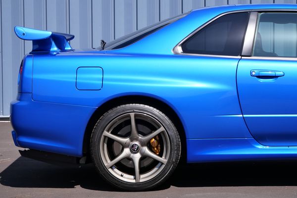 blue 2001 Nissan Skyline GT-R R34 V-spec 2 for sale by Sandbox Motors