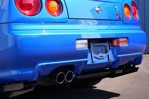 blue 2001 Nissan Skyline GT-R R34 V-spec 2 for sale by Sandbox Motors