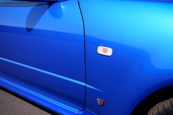 blue 2001 Nissan Skyline GT-R R34 V-spec 2 for sale by Sandbox Motors