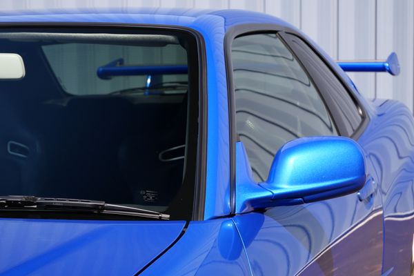 blue 2001 Nissan Skyline GT-R R34 V-spec 2 for sale by Sandbox Motors