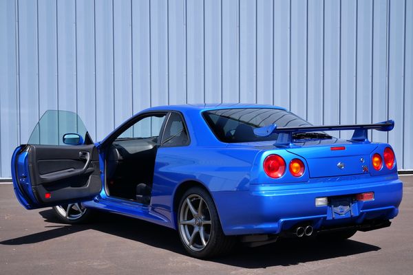 blue 2001 Nissan Skyline GT-R R34 V-spec 2 for sale by Sandbox Motors