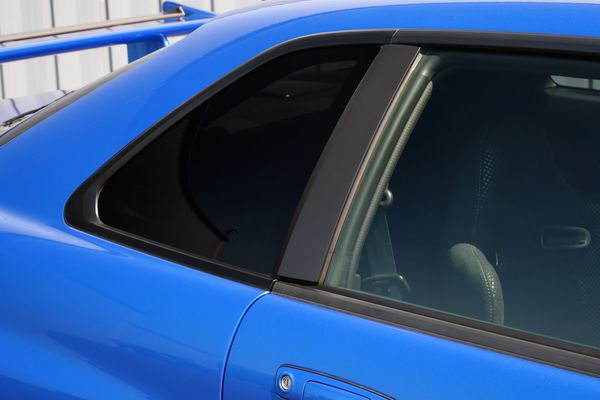 blue 2001 Nissan Skyline GT-R R34 V-spec 2 for sale by Sandbox Motors