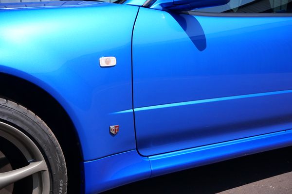 blue 2001 Nissan Skyline GT-R R34 V-spec 2 for sale by Sandbox Motors