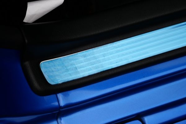blue 2001 Nissan Skyline GT-R R34 V-spec 2 for sale by Sandbox Motors