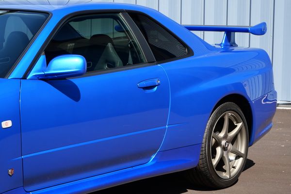 blue 2001 Nissan Skyline GT-R R34 V-spec 2 for sale by Sandbox Motors