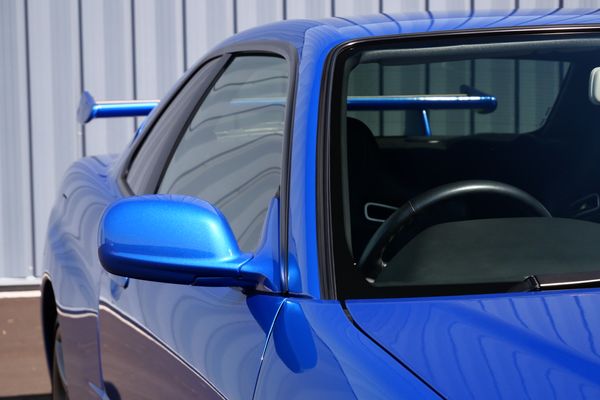 blue 2001 Nissan Skyline GT-R R34 V-spec 2 for sale by Sandbox Motors