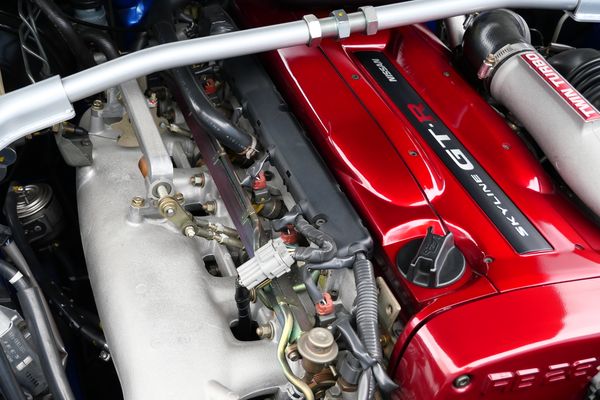 blue 2001 Nissan Skyline GT-R R34 V-spec 2 for sale by Sandbox Motors