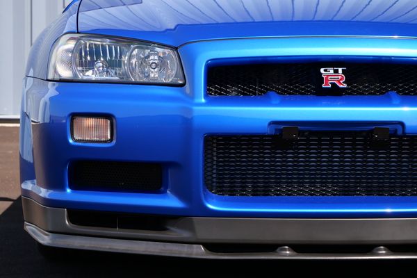 blue 2001 Nissan Skyline GT-R R34 V-spec 2 for sale by Sandbox Motors