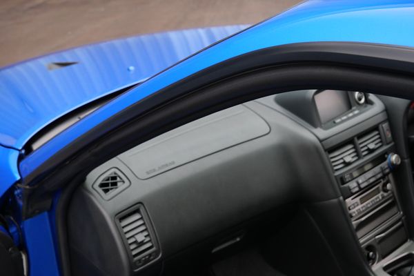 blue 2001 Nissan Skyline GT-R R34 V-spec 2 for sale by Sandbox Motors