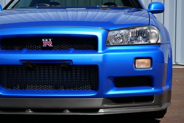 blue 2001 Nissan Skyline GT-R R34 V-spec 2 for sale by Sandbox Motors