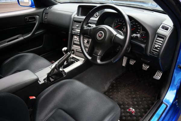 blue 2001 Nissan Skyline GT-R R34 V-spec 2 for sale by Sandbox Motors