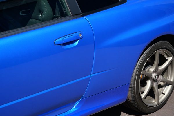 blue 2001 Nissan Skyline GT-R R34 V-spec 2 for sale by Sandbox Motors