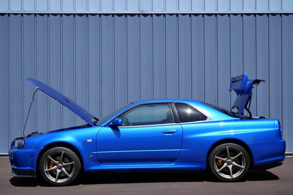 blue 2001 Nissan Skyline GT-R R34 V-spec 2 for sale by Sandbox Motors