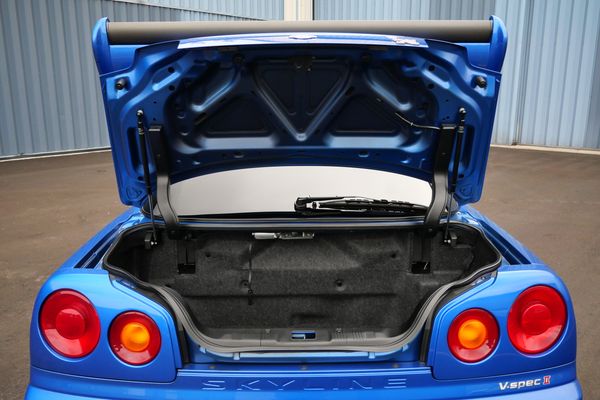 blue 2001 Nissan Skyline GT-R R34 V-spec 2 for sale by Sandbox Motors
