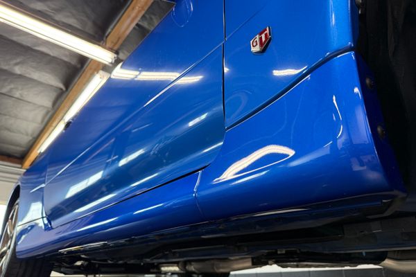blue 2001 Nissan Skyline GT-R R34 V-spec 2 for sale by Sandbox Motors