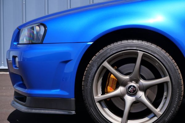 blue 2001 Nissan Skyline GT-R R34 V-spec 2 for sale by Sandbox Motors