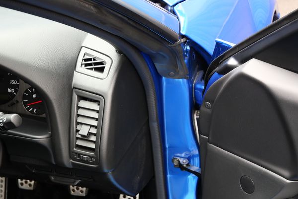 blue 2001 Nissan Skyline GT-R R34 V-spec 2 for sale by Sandbox Motors