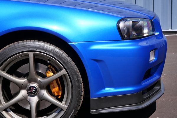 blue 2001 Nissan Skyline GT-R R34 V-spec 2 for sale by Sandbox Motors