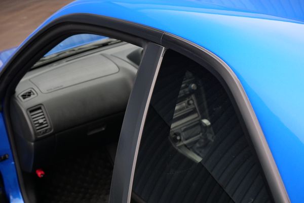 blue 2001 Nissan Skyline GT-R R34 V-spec 2 for sale by Sandbox Motors