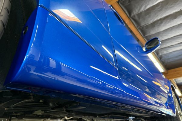 blue 2001 Nissan Skyline GT-R R34 V-spec 2 for sale by Sandbox Motors