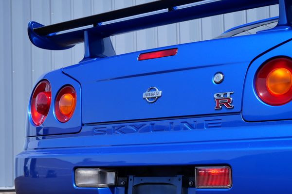 blue 2001 Nissan Skyline GT-R R34 V-spec 2 for sale by Sandbox Motors