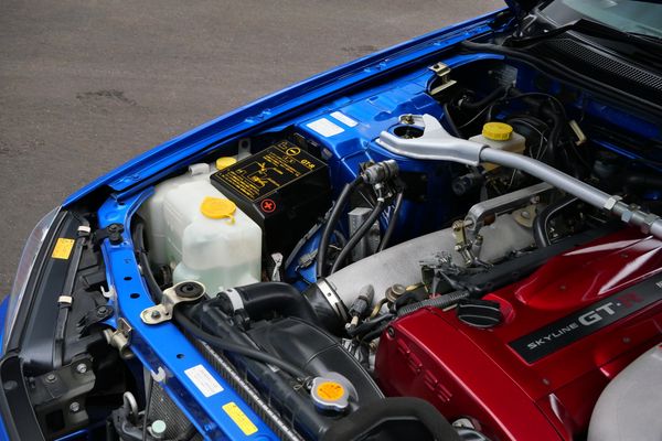 blue 2001 Nissan Skyline GT-R R34 V-spec 2 for sale by Sandbox Motors