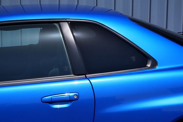 blue 2001 Nissan Skyline GT-R R34 V-spec 2 for sale by Sandbox Motors