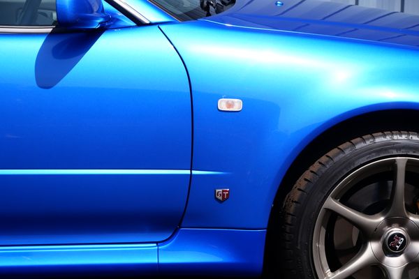 blue 2001 Nissan Skyline GT-R R34 V-spec 2 for sale by Sandbox Motors