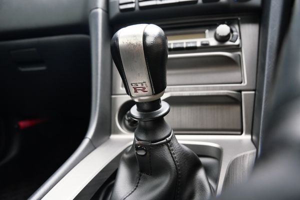 blue 2001 Nissan Skyline GT-R R34 V-spec 2 for sale by Sandbox Motors