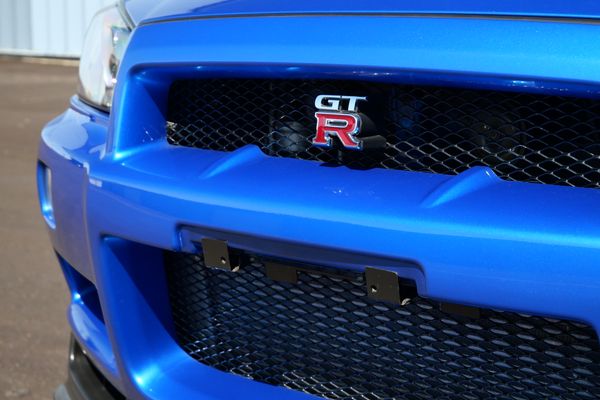 blue 2001 Nissan Skyline GT-R R34 V-spec 2 for sale by Sandbox Motors