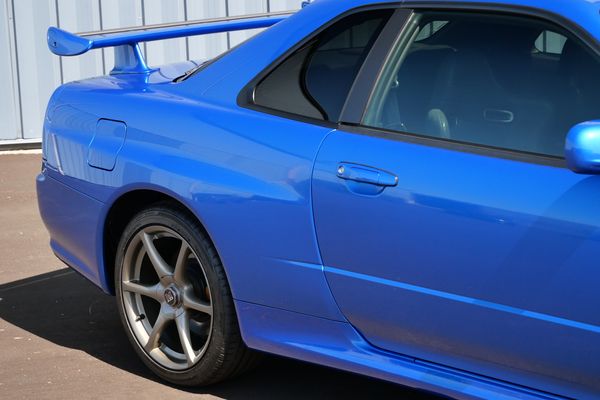 blue 2001 Nissan Skyline GT-R R34 V-spec 2 for sale by Sandbox Motors